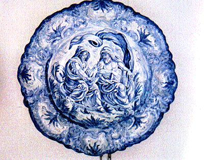 Artistic italian pottery of Albisola - Baroque plate in majolica

representing "Allegory of the Wisdom" 